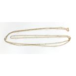 Unmarked gold and seed pearl long guard necklace, 150cm in length, approximate weight 13.6g
