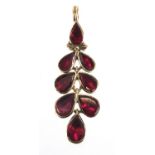 Pair of 9ct gold garnet earrings, 5mm in diameter, approximate weight 1.1g : For further Condition