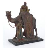 Cold painted spelter table lighter in the form of a carpet seller on a camel, 19cm high Further