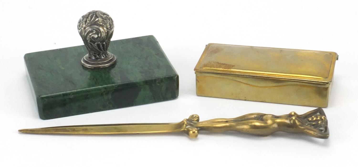 Writing objects comprising a silver handled green marble paperweight, brass stamp case and brass