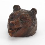 Swiss Black forest carved wooden bears head stamp box, with beaded eyes, 9cm in length Further