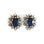 Pair of 18ct white gold sapphire and diamond cluster earrings, 1.5cm in length, approximate weight