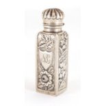 Victorian silver scent bottle embossed with flowers, hinged lid and glass stopper, A.W.P