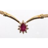 14ct gold tear drop ruby and diamond necklace, 24cm in length, housed in a Christian Bernard of