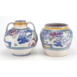 Two Poole pottery Bluebird patterned vases, one of ovoid form with twin handles, both with factory
