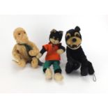 Three vintage animals including a straw filled Felix the cat, the largest 41cm high Further