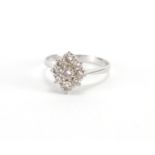 18ct white gold diamond cluster ring, size P, approximate weight 2.7g Further condition reports