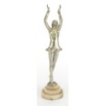 Art Deco silvered metal study of a performer, raised on a circular stepped onyx base, 39cm high