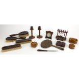 Collection of faux tortoiseshell including hand brushes, pair of candlesticks and a strut clock, the