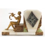 Art Deco marble and onyx mantel clock, signed J Dauvergne, mounted with a female holding a bird, the