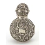 Miniature silver cased green glass scent bottle embossed with birds and foliage, Birmingham 1901,