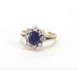 18ct white gold sapphire and diamond ring, size O, approximate weight 4.5g Further condition reports