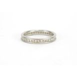 Unmarked platinum and diamond eternity ring, size O, approximate weight 3.8g The piece is set with