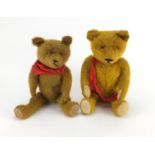 Two vintage golden straw filled teddy bear's with jointed limbs and beaded eyes, one with growler,