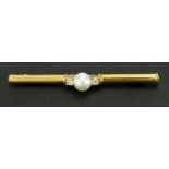 18ct gold pearl and diamond bar brooch, 6.5cm in length, approximate weight 7.0g Diamonds are modern