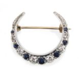 9ct gold Diamond and Sapphire moon crest brooch, marked FRS Ltd, 2.5cm in length, approximate weight