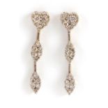 Pair of unmarked gold Diamond love heart drop earrings, 3cm in length, approximate weight 3.4g