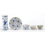 Chinese porcelain comprising cylindrical blue and white vase, doucai tea bowl and saucer and two