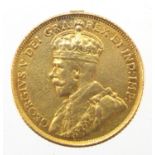 George V Canadian 1913 gold five dollars, approximate weight 8.4g : For further Condition Reports