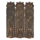 Three Arts & Crafts copper door plates, each embossed with stylised flowers, 30cm x 8cm : For