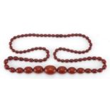 Amber coloured bead necklace, 84cm in length, approximate weight 61.4g : For further Condition