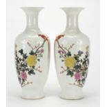 Pair of Chinese porcelain baluster vases, hand painted in the famille rose palette with birds of