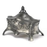 WMF pewter silk lined casket, embossed with stylised flowers, impressed marks to the feet, 10cm H