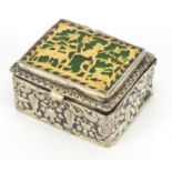 18th century rectangular unmarked silver and enamel pill box embossed with flowers, the hinged green