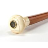 Malacca walking cane with turned ivory handle having an inset compass, 82cm in length : For