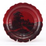 Royal Doulton Flambe dish with flared rim, decorated with a cottage, numbered 8206, 25cm in diameter