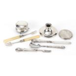 Silver items including three footed jewel box, dwarf candlestick, compact and cutlery, various