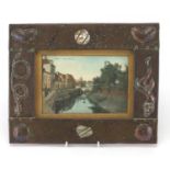 Arts & Crafts rectangular copper photo frame with Mother of Pearl inlay, embossed with snakes and