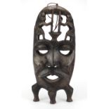 Large African tribal carved wooden face mask, 58cm high : For further Condition Reports Please Visit