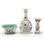 Chinese porcelain comprising a square footed bowl and two famille rose vases, all hand painted