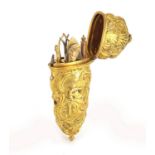 18th century Rococo gilt metal repoussé etui decorated with nude maidens within C scrolls, the