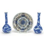 Pair of Chinese blue and white porcelain Prunus bottle vases, together with a blue and white