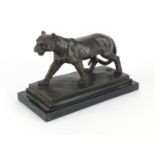 Bronze puma, raised on a square black marble base, signed Barye, 24cm wide : For further Condition