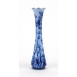 Moorcroft pottery florian ware vase with blue floral decoration, painted and factory marks to the