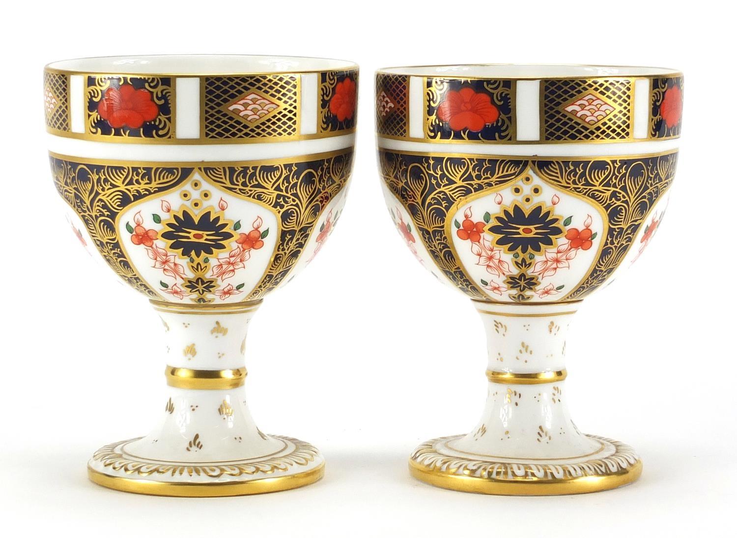 Pair of Royal Crown Derby old Imari pedestal goblets, each 12cm high : For further Condition Reports