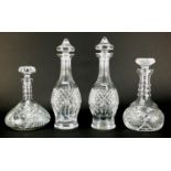 Four cut glass decanters including a pair, the largest 33cm high : For further Condition Reports