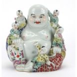 Chinese porcelain figure of Buddha with five children, hand painted in the famille rose palette,