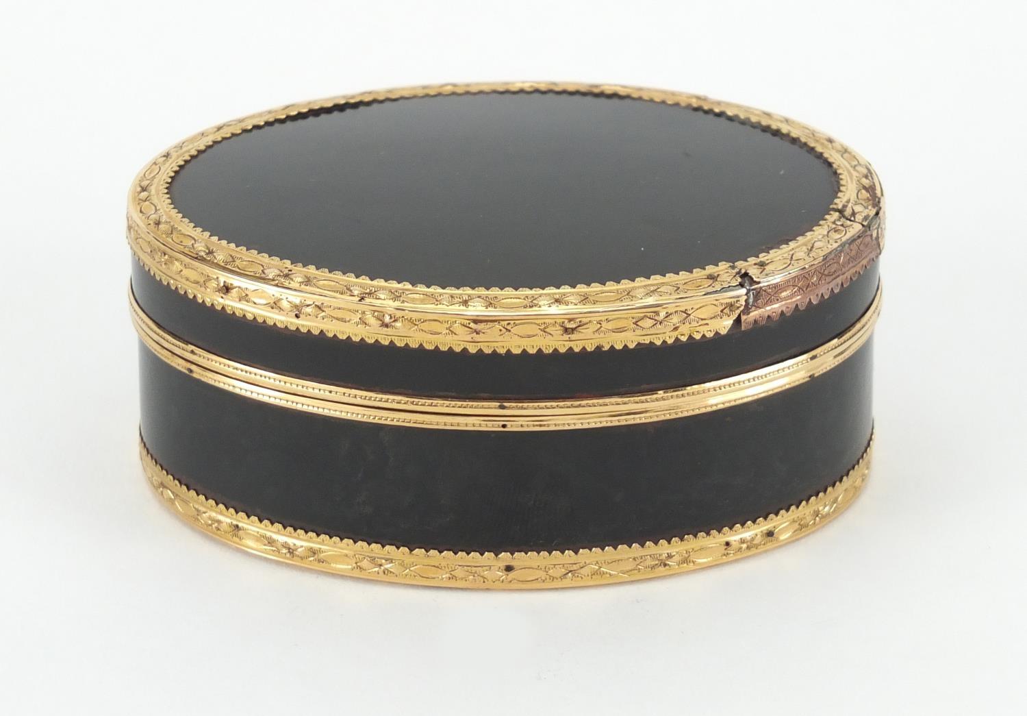 18th century French oval tortoiseshell snuff box with gold mounts, indistinct marks to the inside