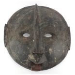 African Tribal carved wooden face mask, 46cm in diameter : For further Condition Reports Please