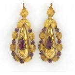 Pair of Victorian unmarked gold garnet drop earrings, housed in an E.P. Mallory & Son tooled leather