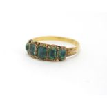 Antique unmarked gold emerald five stone ring, housed in a Hilton & Son leather box, size R,