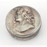 Art Nouveau silver pill box, the lid embossed with a maidens head, A.W.P Birmingham 1902, 3.8cm in