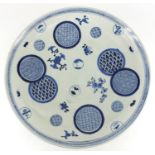 Japanese Arita porcelain charger hand painted with geometric roundels and floral sprays, character