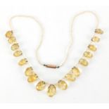 Faceted citrine and seed pearl necklace, 40cm in length, housed in a Garrard & Co box : For