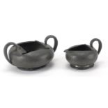 Arts & Crafts Liberty & Co Tudric pewter sugar bowl and milk, both numbered 0966, the largest 13cm