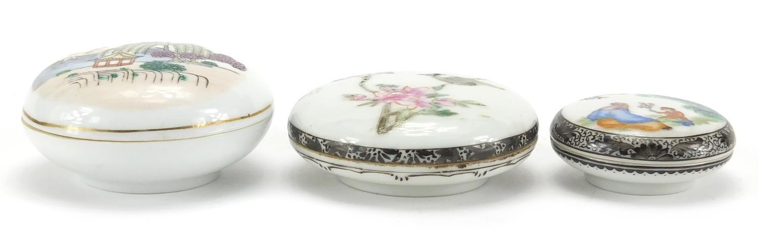 Three Chinese porcelain seal/rouge boxes, one hand painted in the famille rose palette with a figure